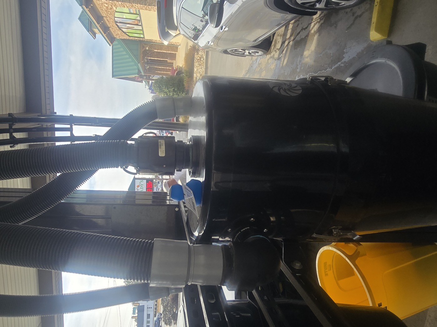 Kosher Duck at Papa Bear Car Wash Hiding on Top of One of the Vacuums